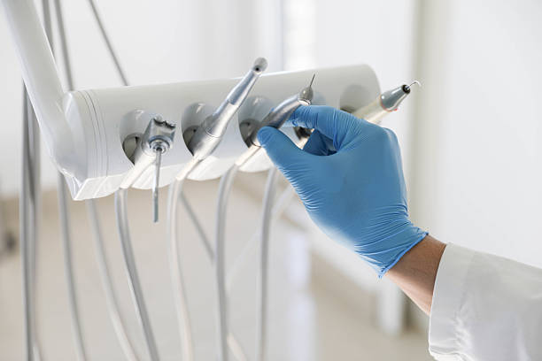 Professional Invisalign Clear Aligners technician working in Essex Junction, VT